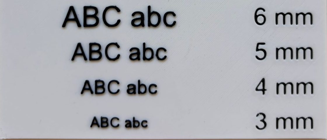 Detalle de la placa de boquilla 0.2: las filas de 6, 5, 4 y 3 mm se leen limpias
