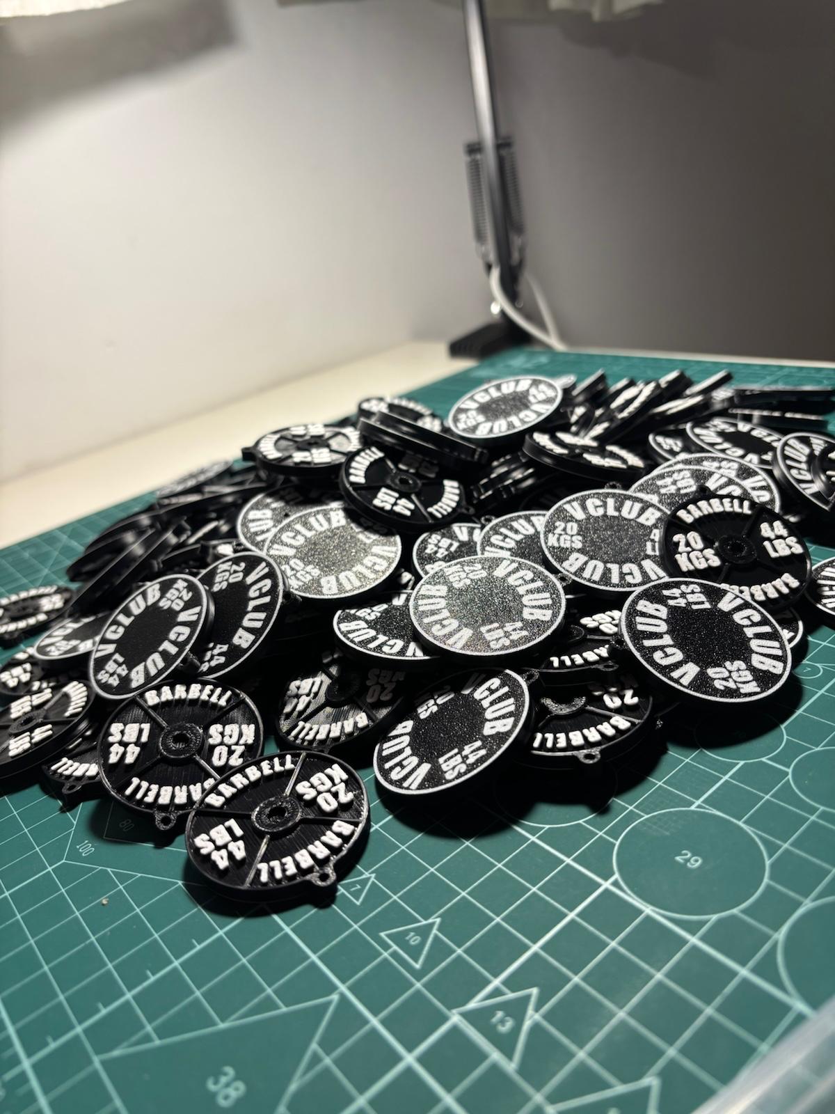 Producción en serie de llaveros personalizados impresos en 3D para empresas — Erwan 3D Studios